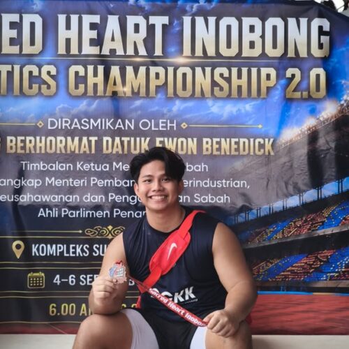 CCKK student-athlete displaying a medal after competing at the Sacred Heart Inobong Athletic Championship 2.0